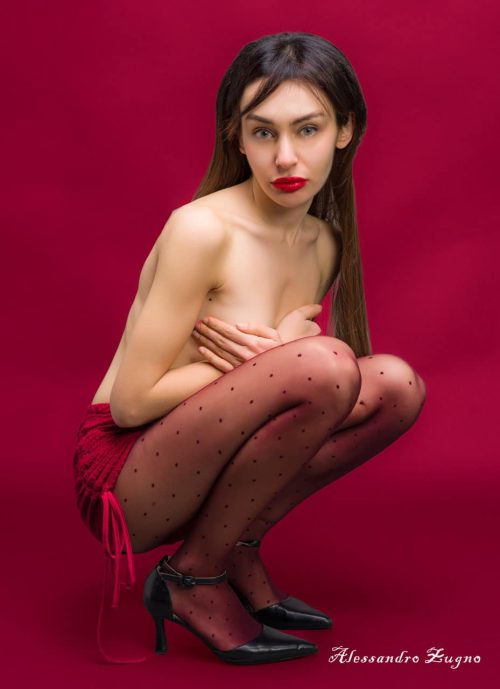 foto natalizia ritratto su sfondo rosso